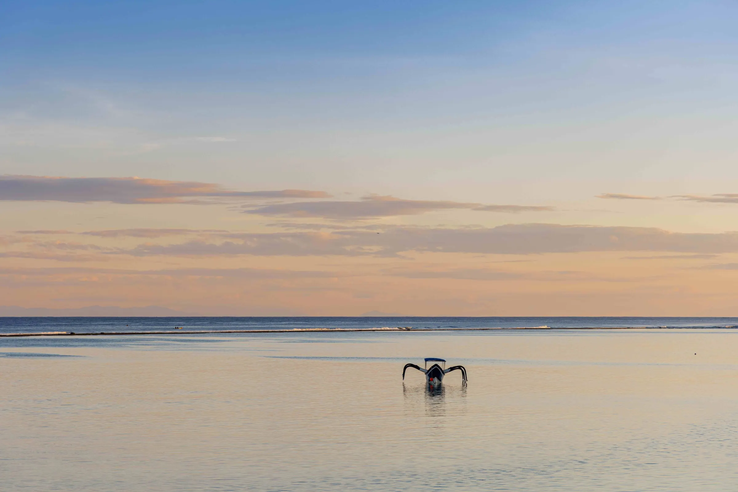 A quiet stretch of Karoso Beach at Cap Karoso, Sumba, in evening light