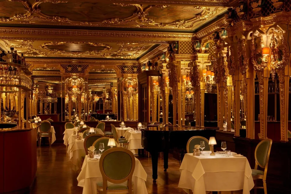 Gilded dining room at Café Royal Grill in Hotel Café Royal, London