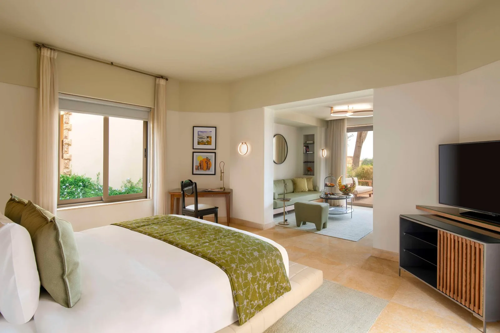 Guestroom and living space at Kempinski Hotel Ishtar Dead Sea
