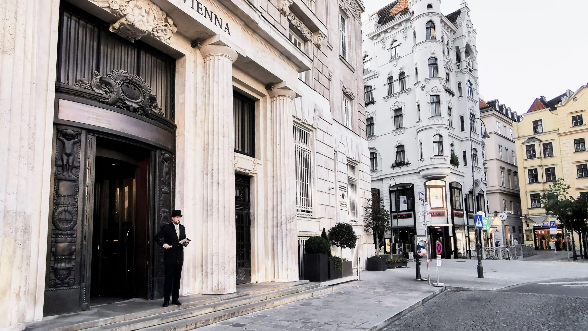 Entrance and stone façade of Park Hyatt Vienna
