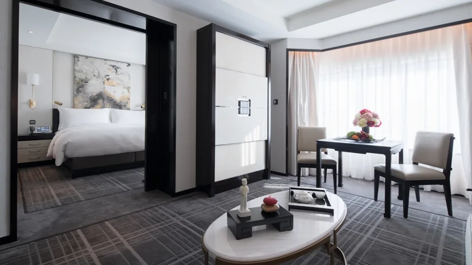 Separate bedroom and sitting room in a Superior Suite at The Peninsula Beijing