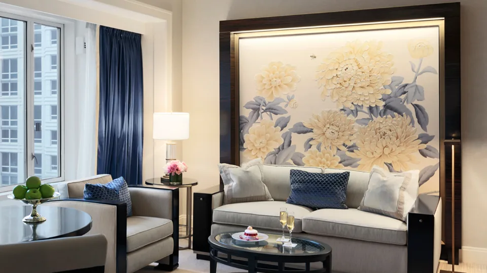 Deluxe Suite sitting area with chrysanthemum artwork at The Peninsula Chicago