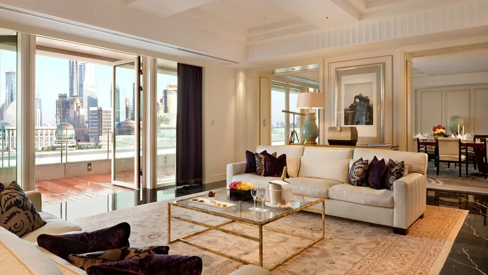 Palace Suite living room and terrace facing Pudong at The Peninsula Shanghai
