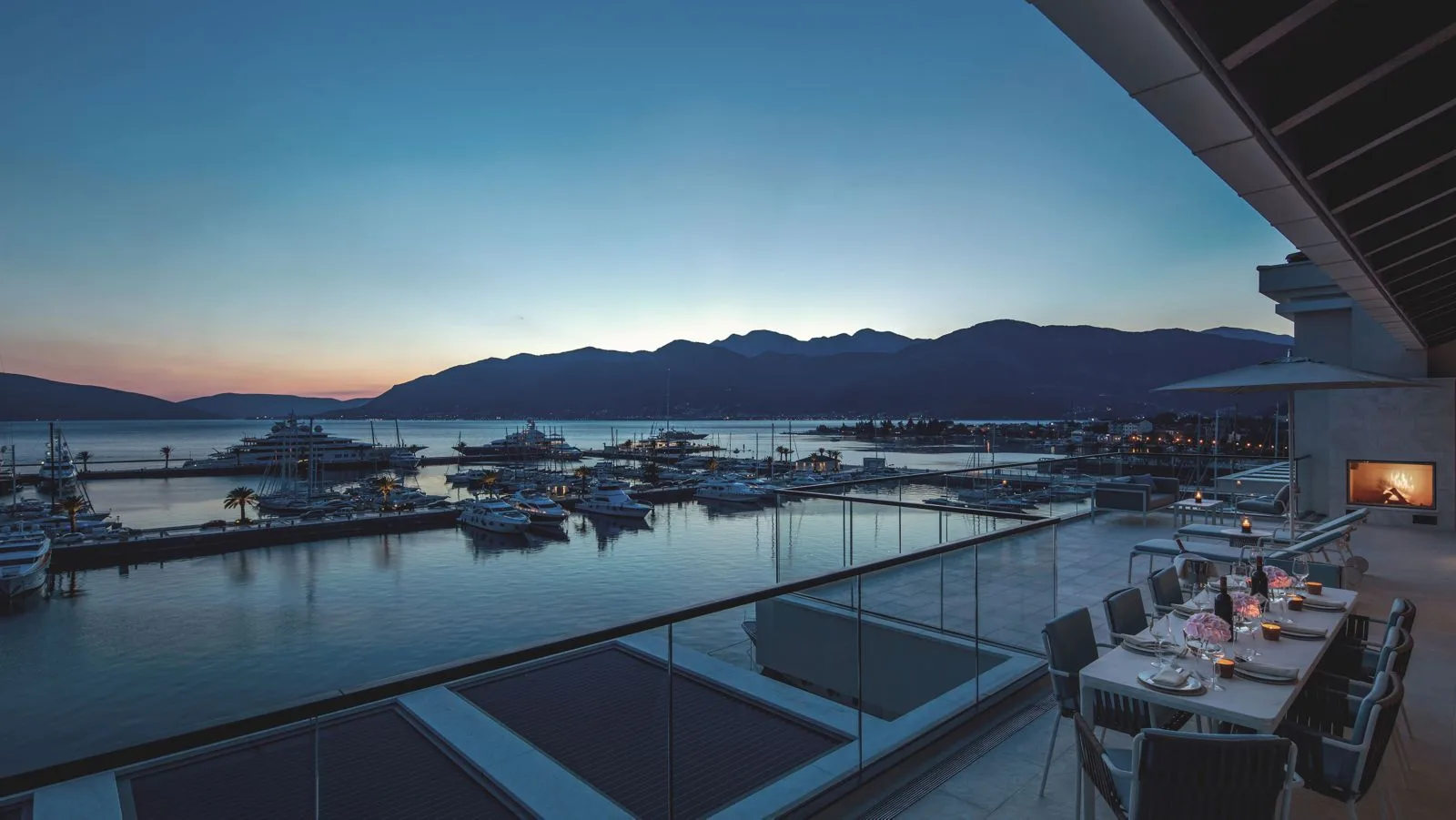 Private terrace overlooking the marina at Regent Porto Montenegro