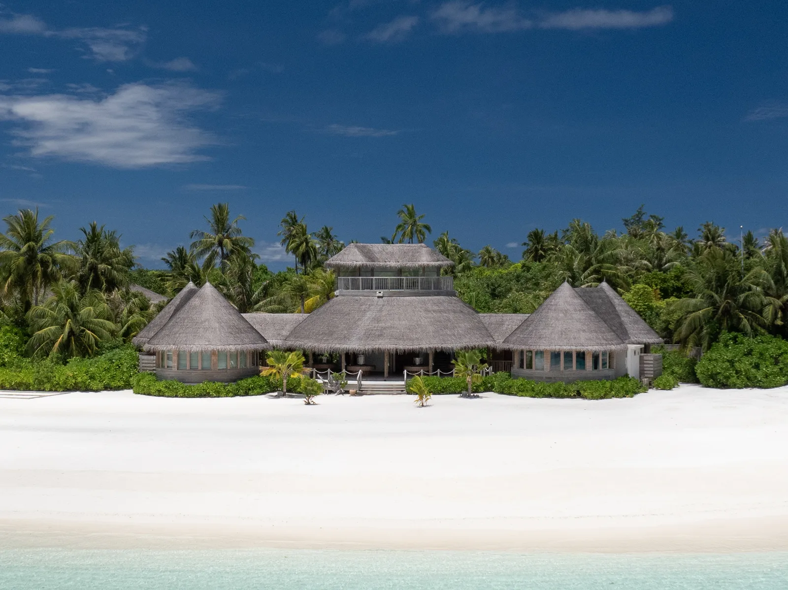 Thatched beachfront SHELL marine education building at Six Senses Laamu
